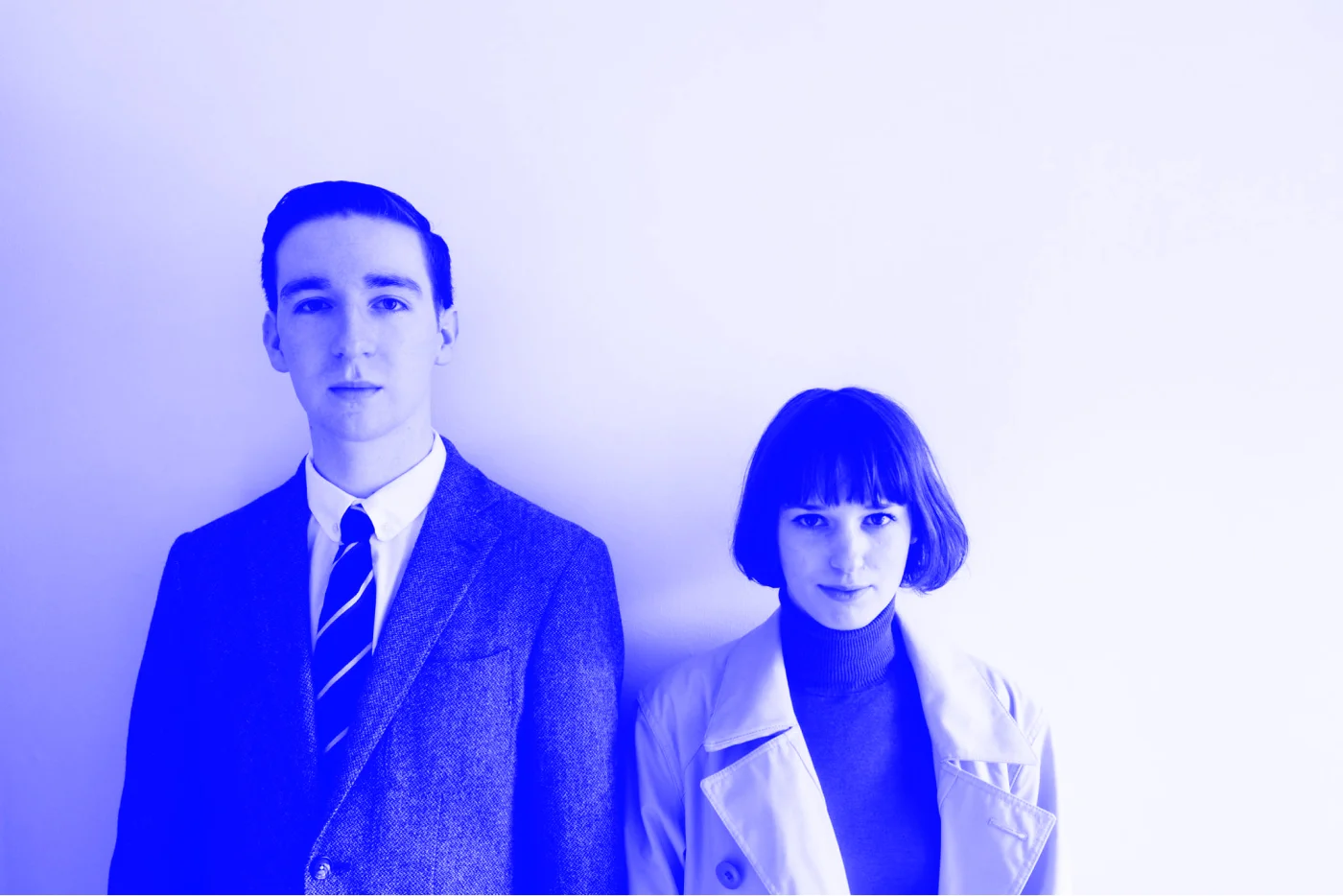 Jess and Patrick dressed like they're from a French nouvelle vague movie.